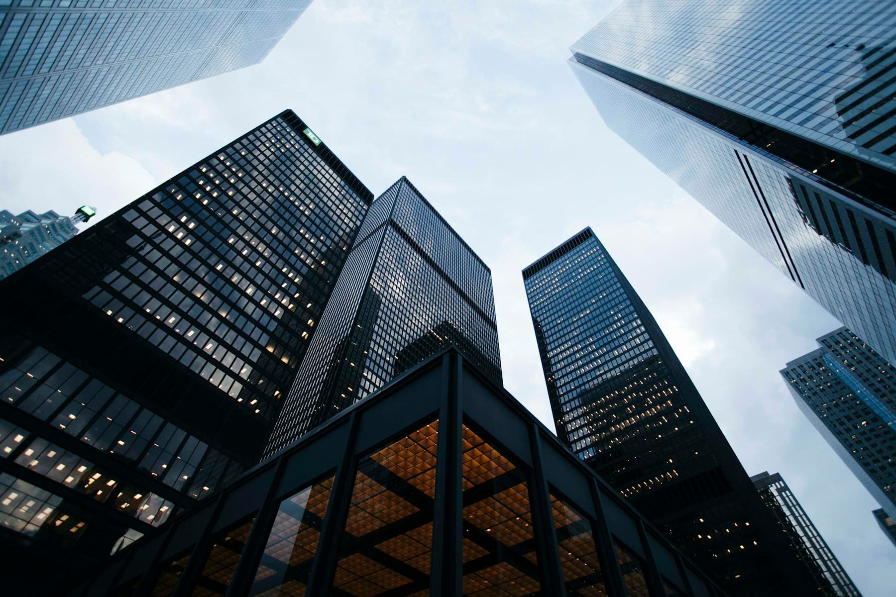 Low-angle view of modern city towers